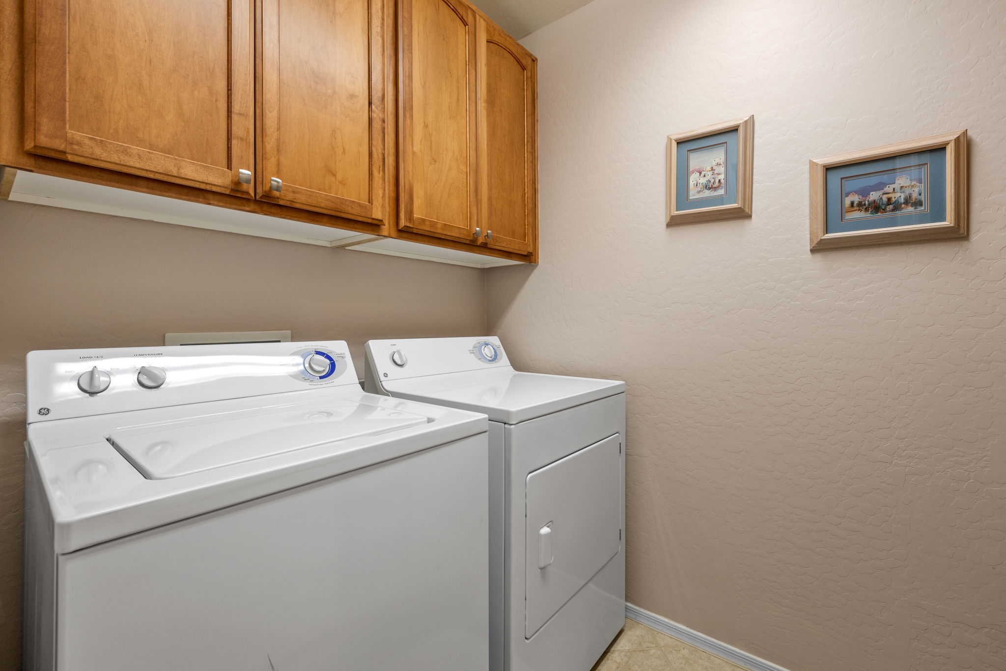 Separate laundry with extra Hanging/storage space