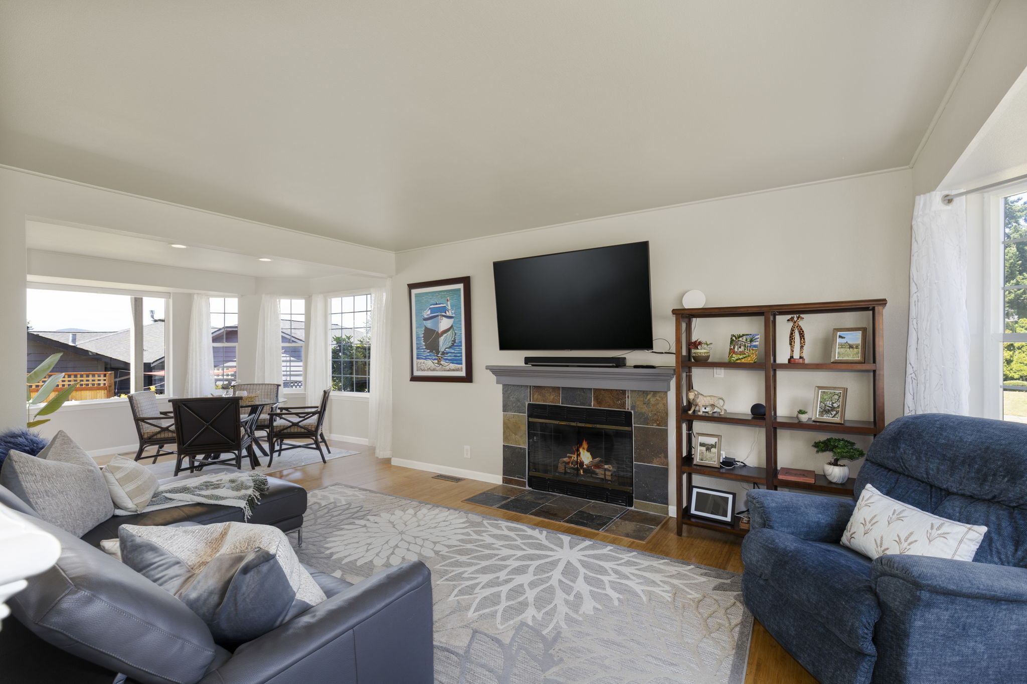 Large living room looking into dining room.