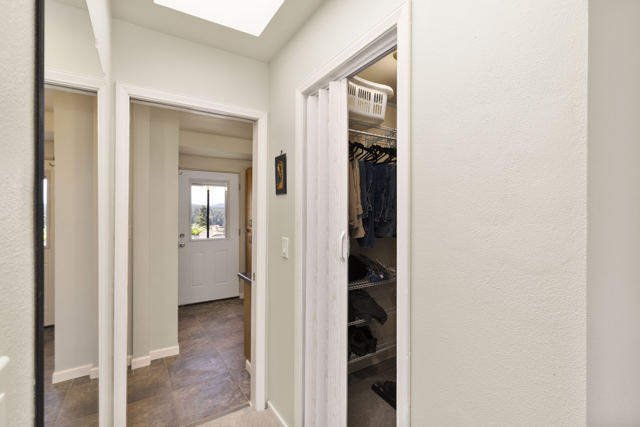 Large closet in primary leading to en-suite and view deck.