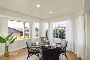 Dining room surrounded by windows and natural light!