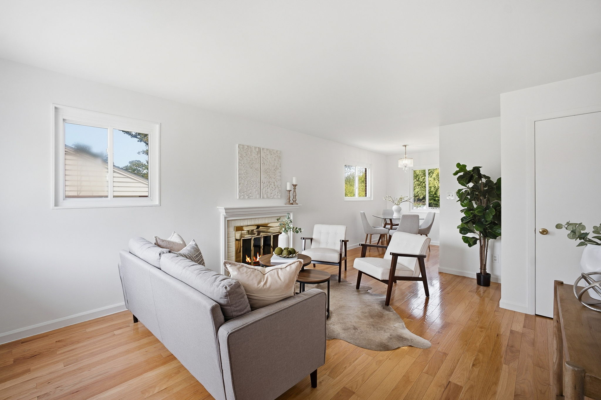 Open living & dining rooms w/hardwoods & fireplace