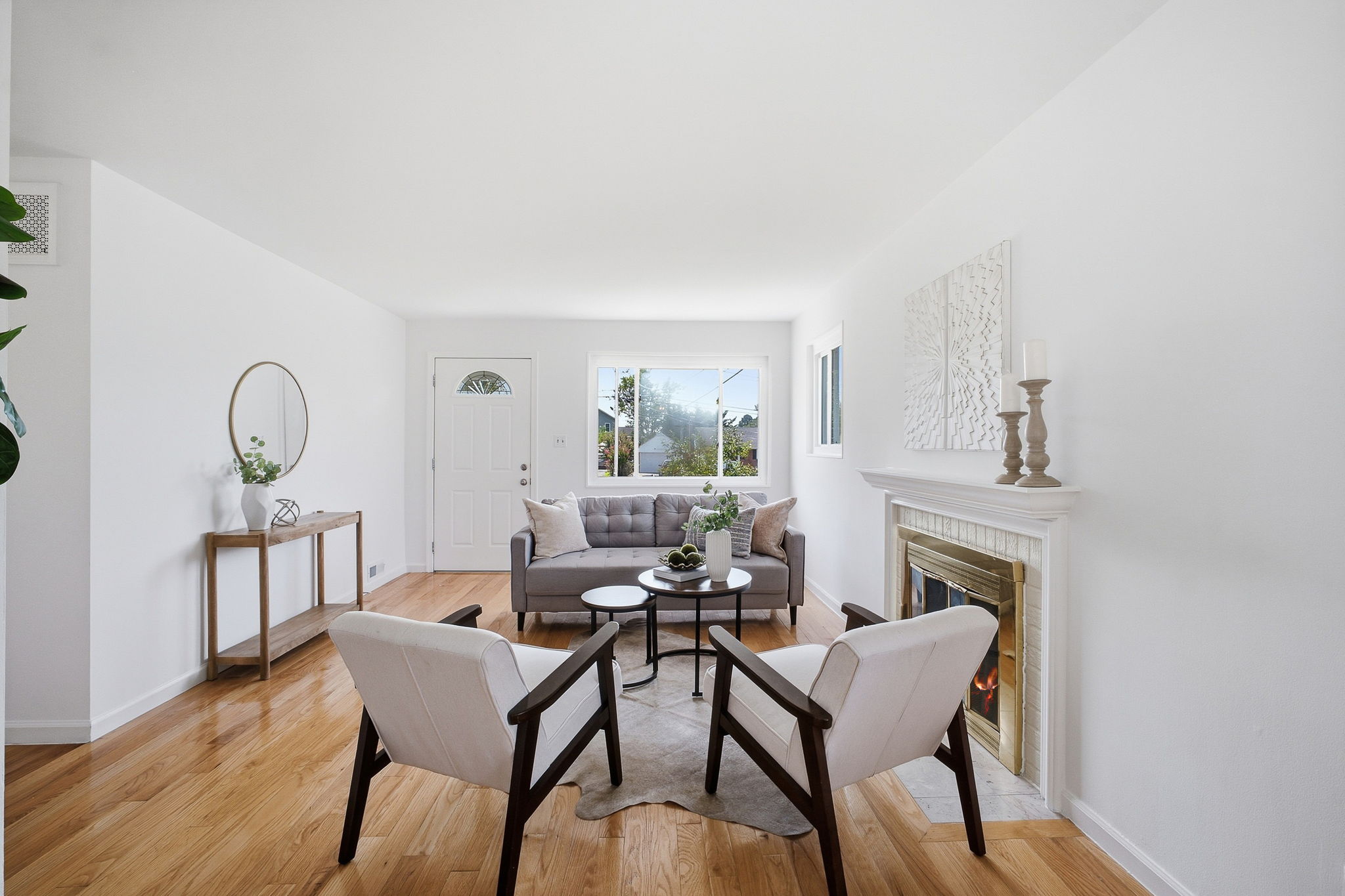 Open living & dining rooms w/hardwoods & fireplace