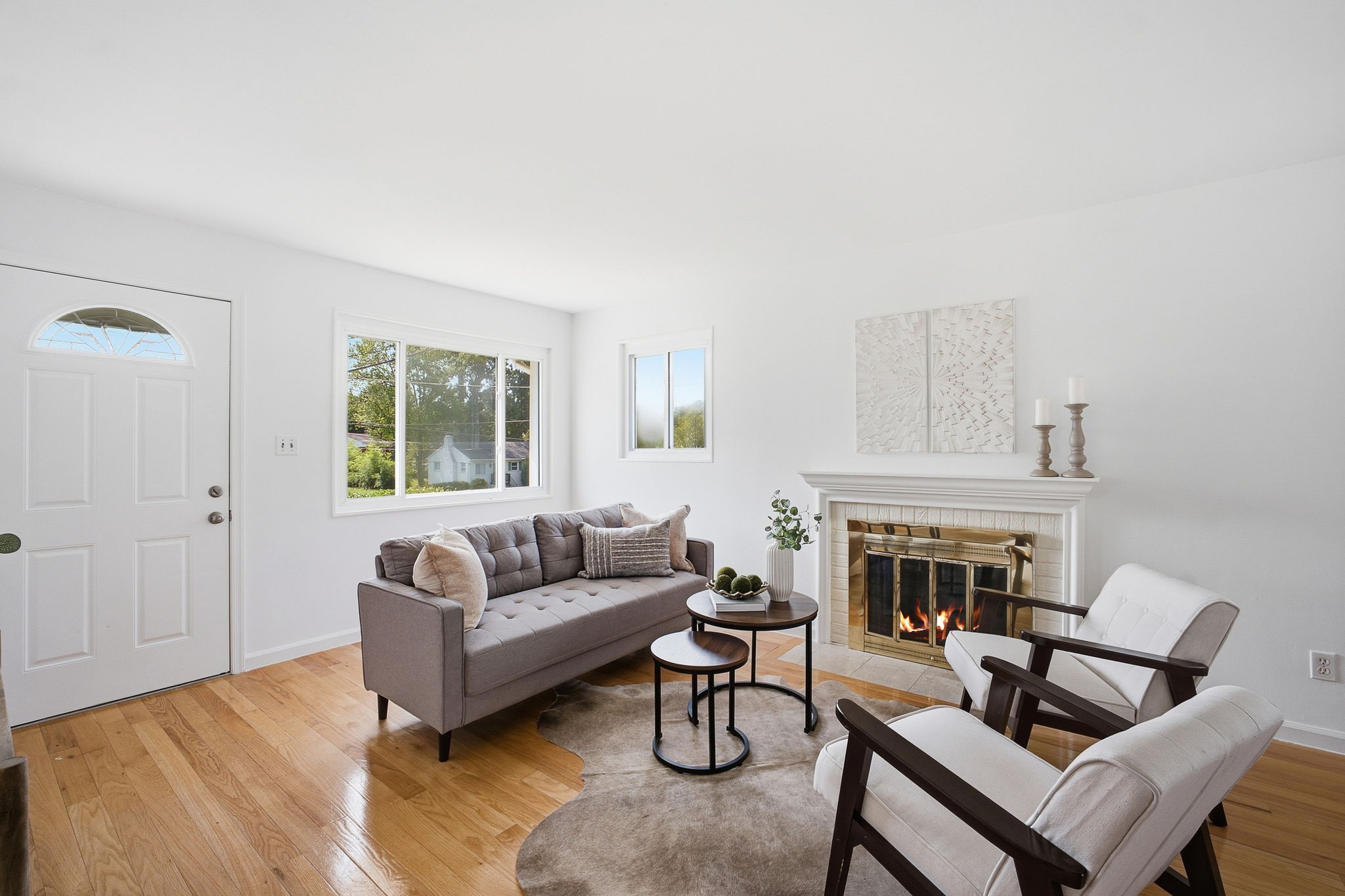 Open living & dining rooms w/hardwoods & fireplace