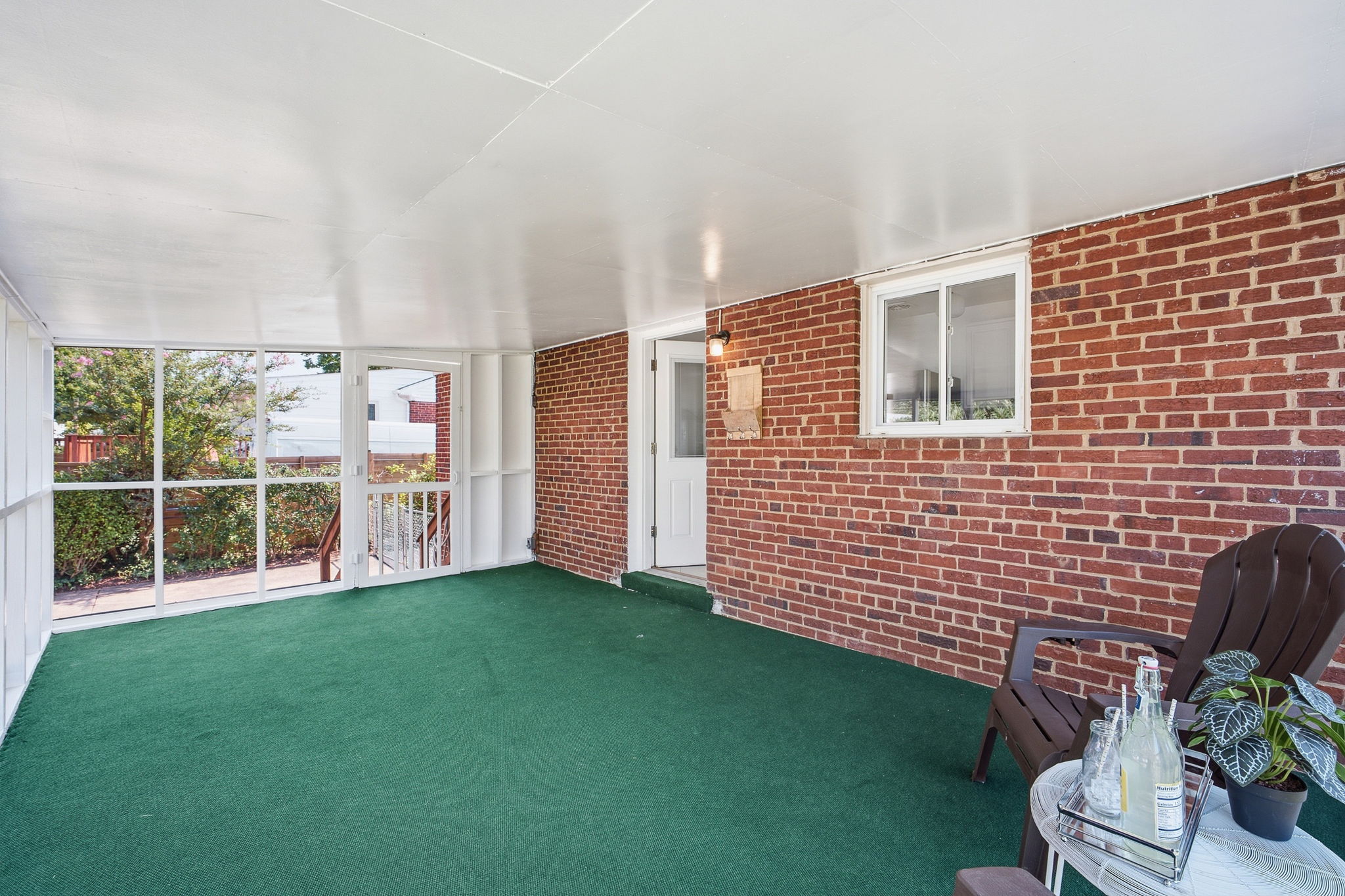 Large screen porch off kitchen