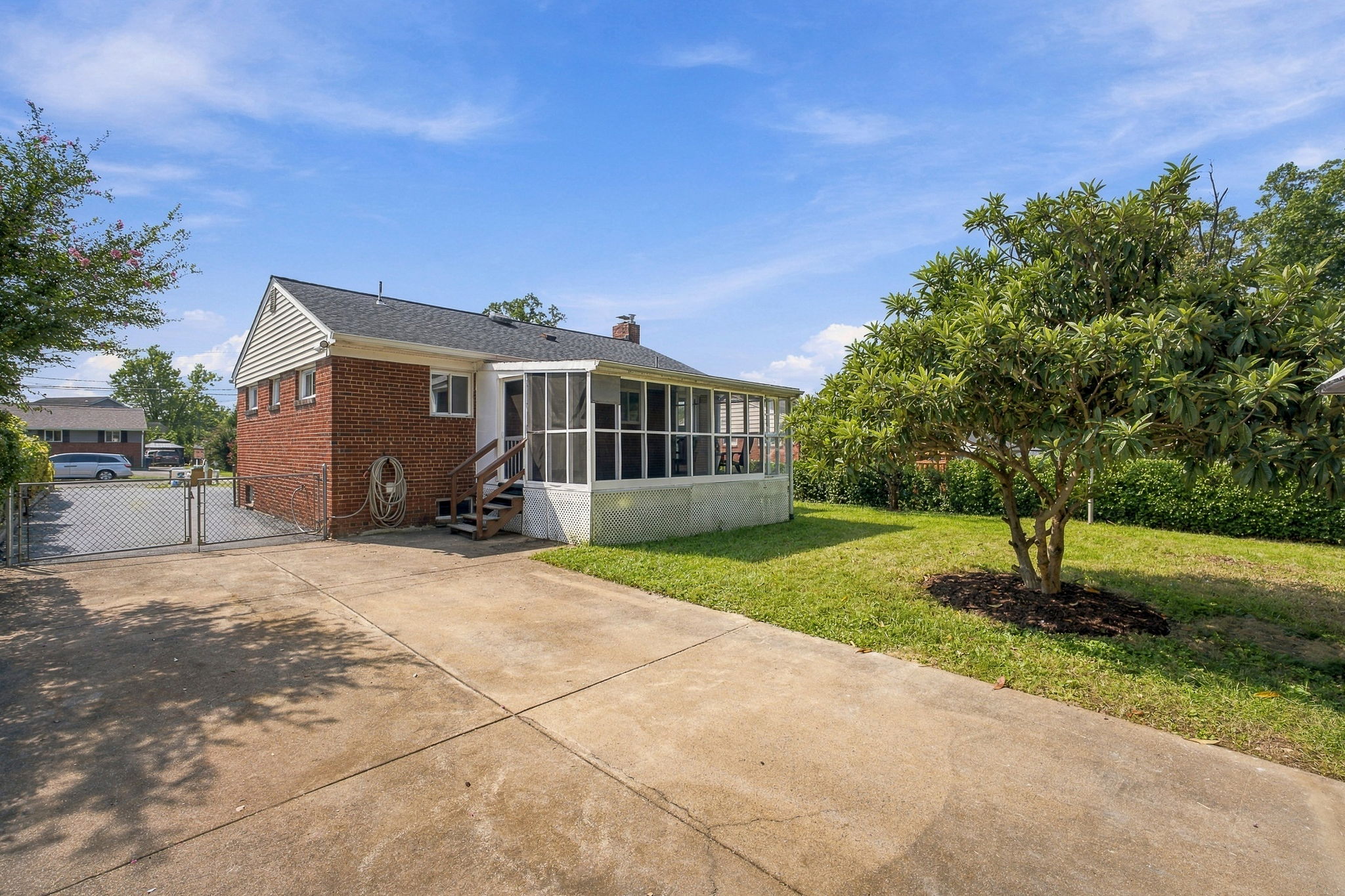Flat fenced backyard + detached garage