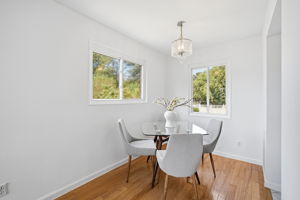 Open living & dining rooms w/hardwoods & fireplace