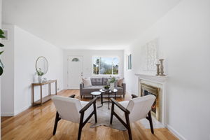 Open living & dining rooms w/hardwoods & fireplace