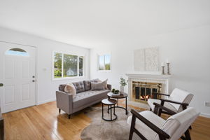 Open living & dining rooms w/hardwoods & fireplace