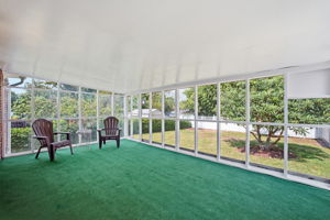 Large screen porch off kitchen