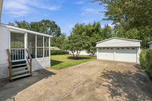Flat fenced backyard + detached garage