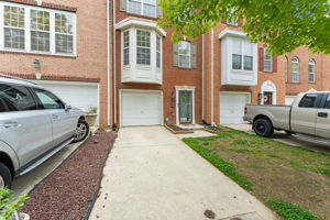Exterior - Front with Garage & Driveway