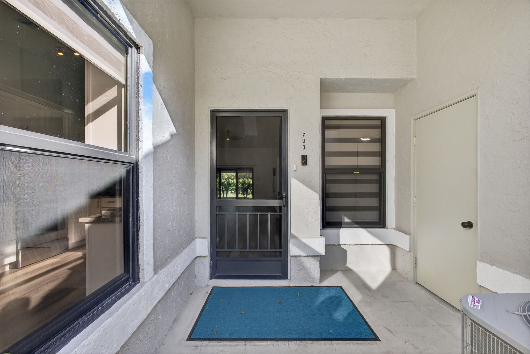 Front Door with Garage Door to the Right