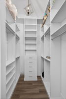 Primary Bedroom Closet with Built-ins