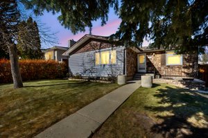 3-7031 Hunterbow Crescent NW, Calgary, AB day to dusk.jpeg