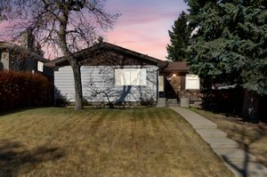 1-7031 Hunterbow Crescent NW, Calgary, AB day to dusk.jpeg