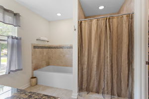Fully tiled shower + garden bath