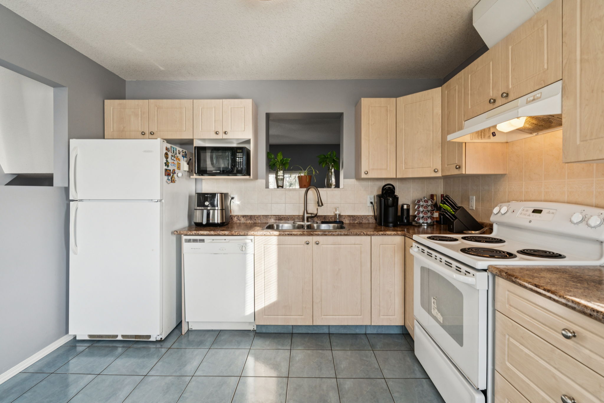 02.13.2026 - Ravi Behal - 7038 16 Ave SE 1224_12