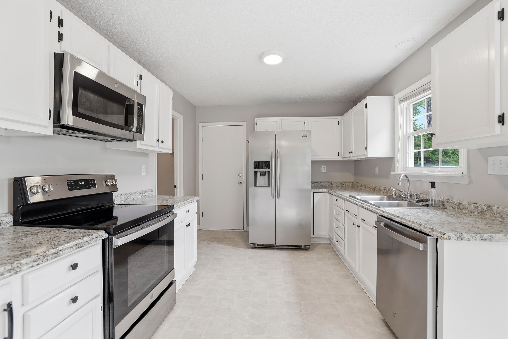 White cabinets and stainless steel appliances