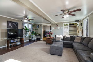 Dining room was by large windows by kitchen