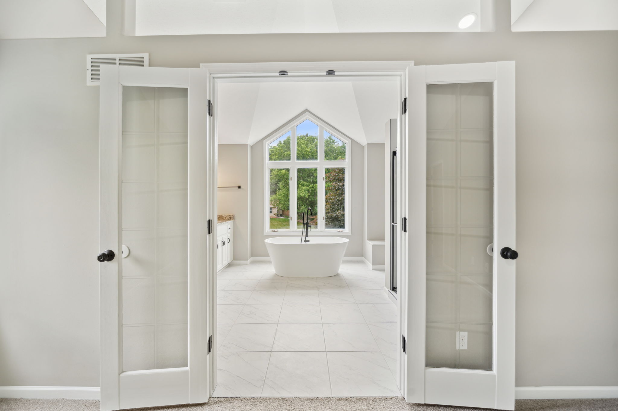 Double door to the primary bath