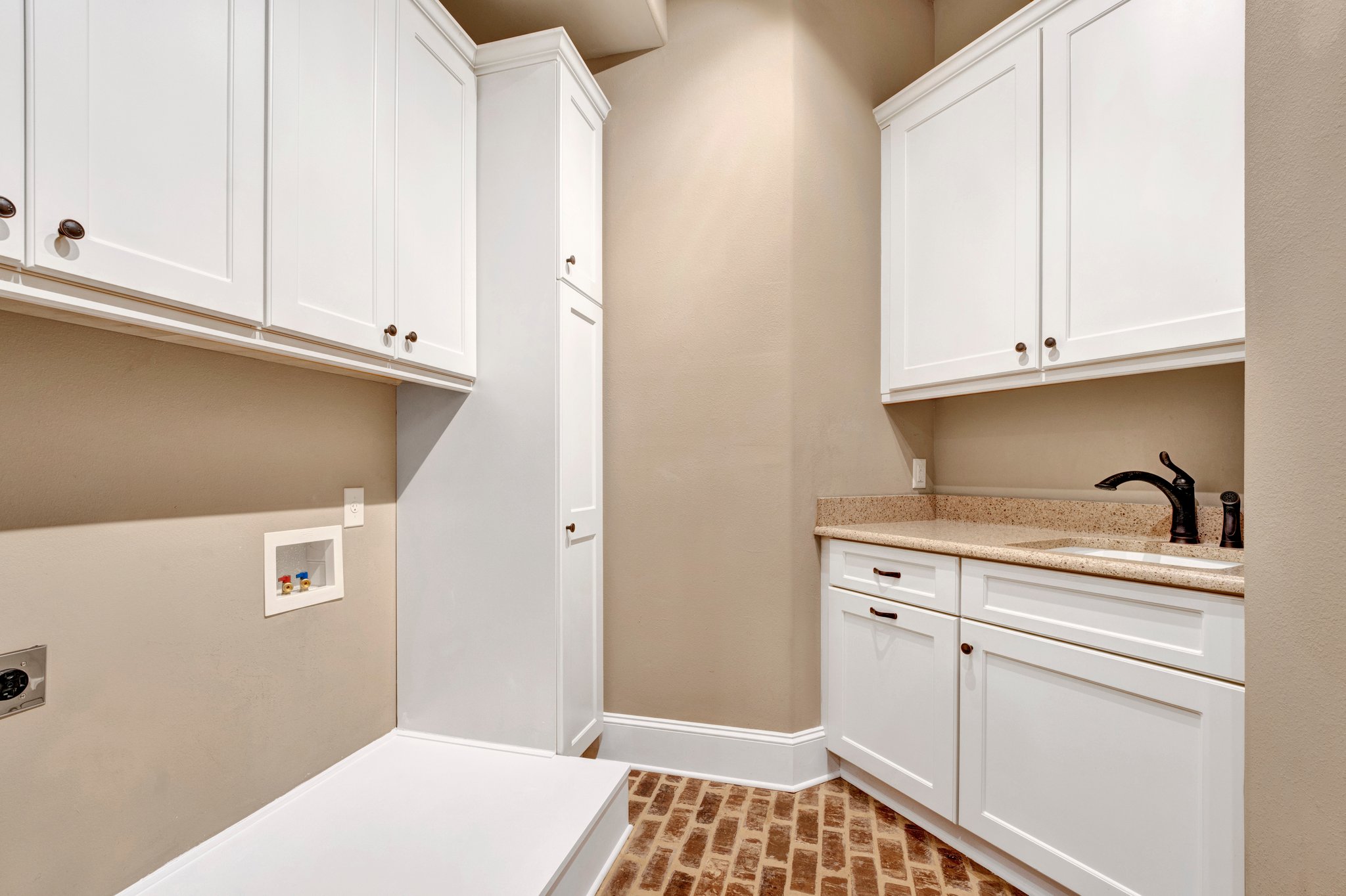 Laundry room with sink