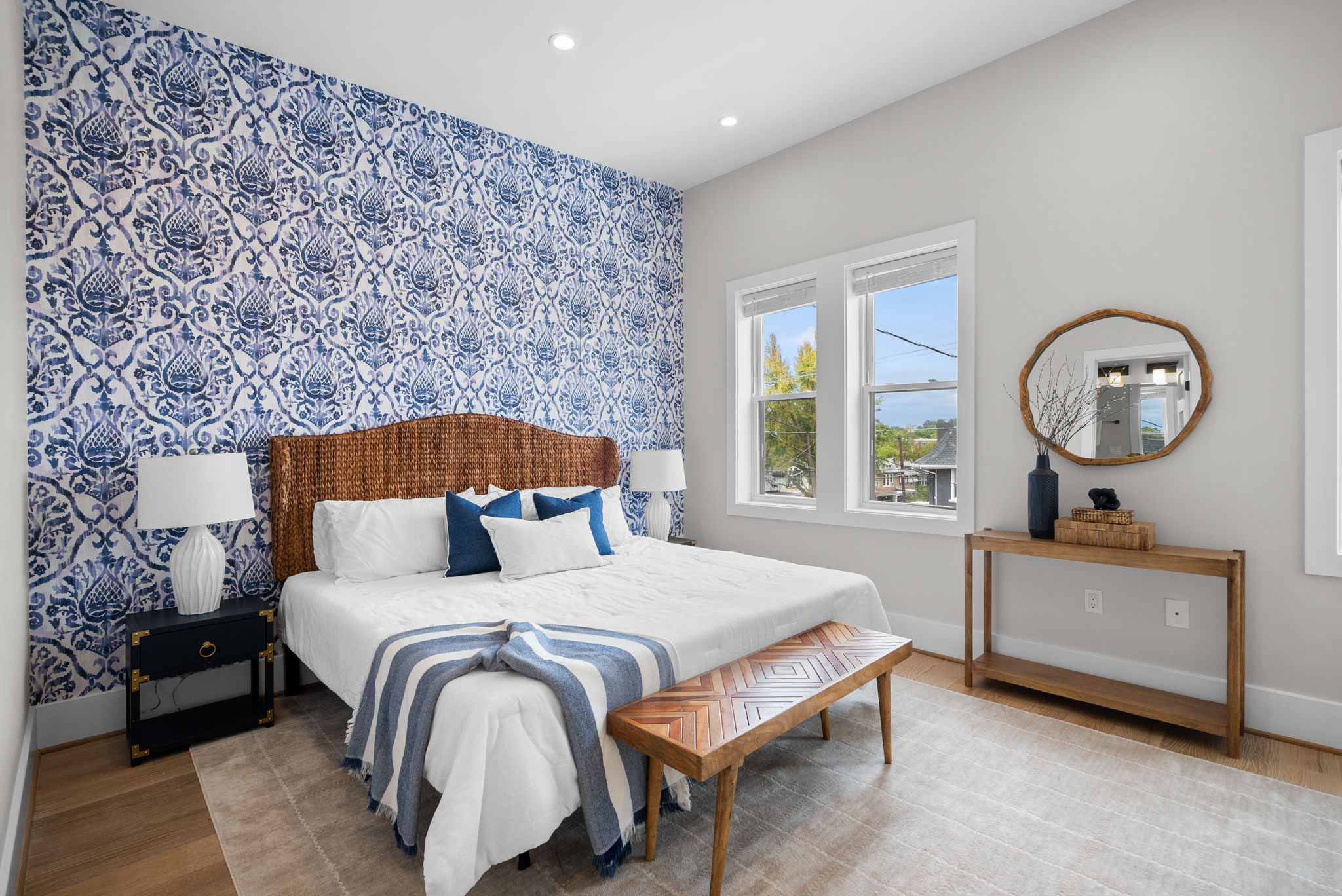 Bedroom with a feature wallpaper wall