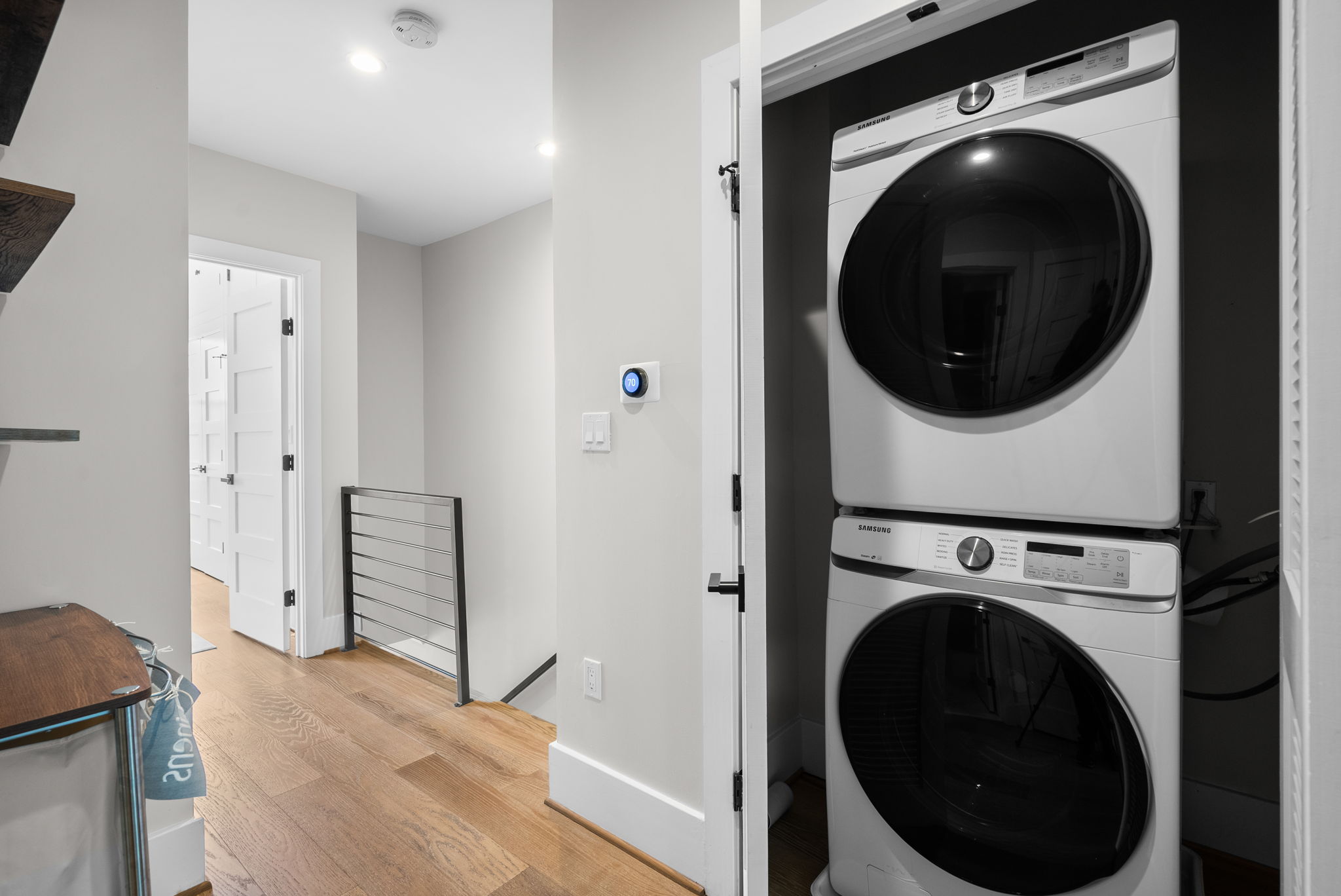 Upper-level laundry with a full-size washer and dryer