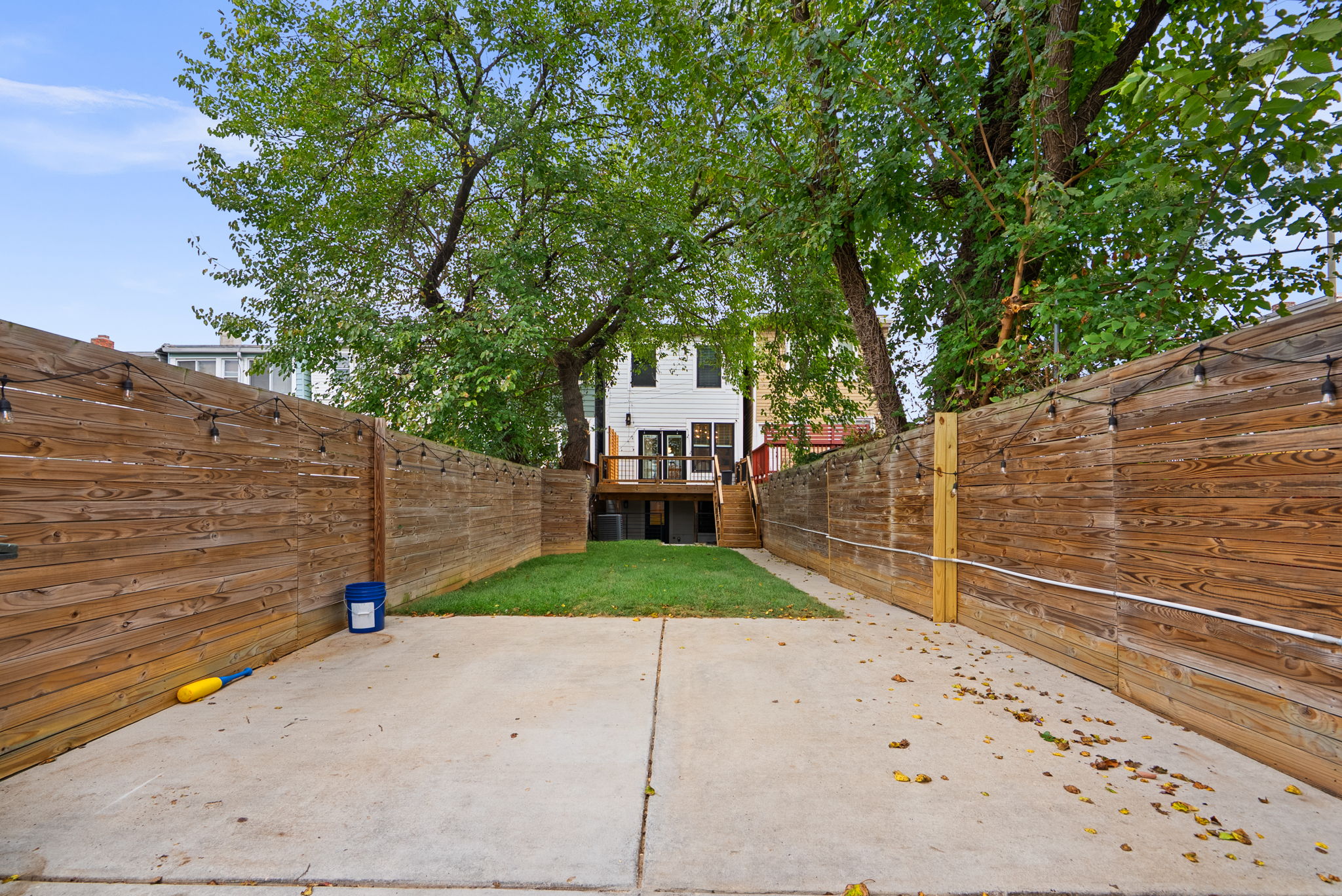 Gated parking pad and yard off the alley