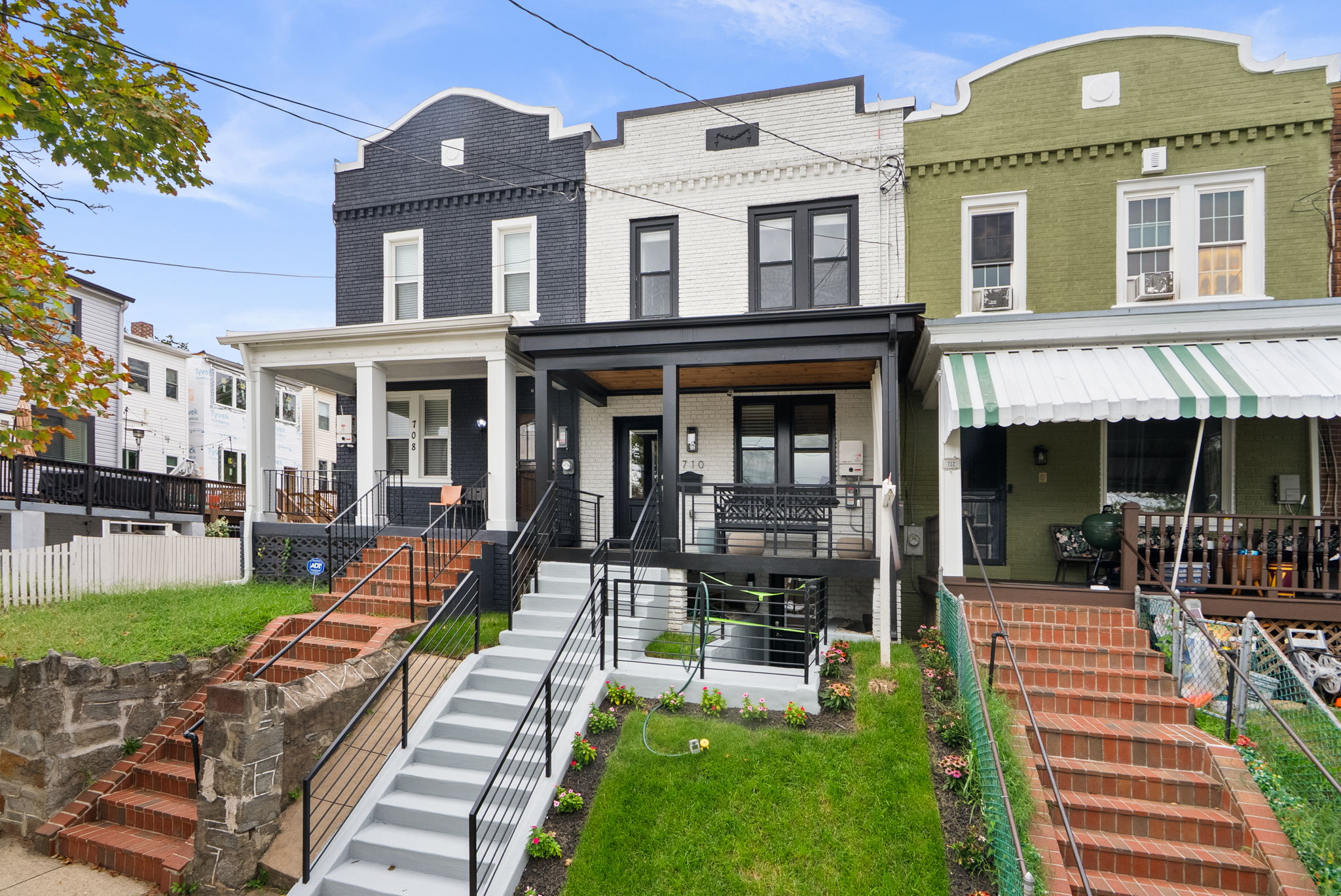 Front steps and a terraced lawn