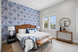 Bedroom with a feature wallpaper wall