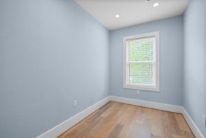 Bedroom with light blue walls