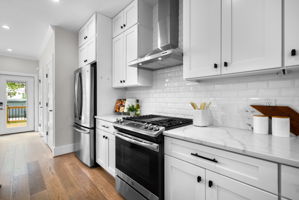 Stainless appliances and a gas range