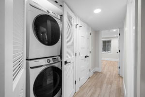 Lower-level laundry, the second full set in the home