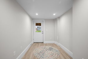 Lower-level hall to the private rear entrance