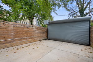Two off-street parking spaces behind a roll-top door