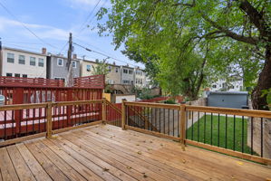 Refinished deck overlooking the backyard