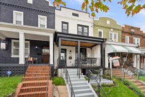 Covered front porch and a restored facade