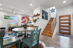 Open floor plan, beautiful and modern finish-outs,  cement floors. The "Austin" sign, guitar, guitar picture, and star at by the landing do not convey (are not included in the sale).