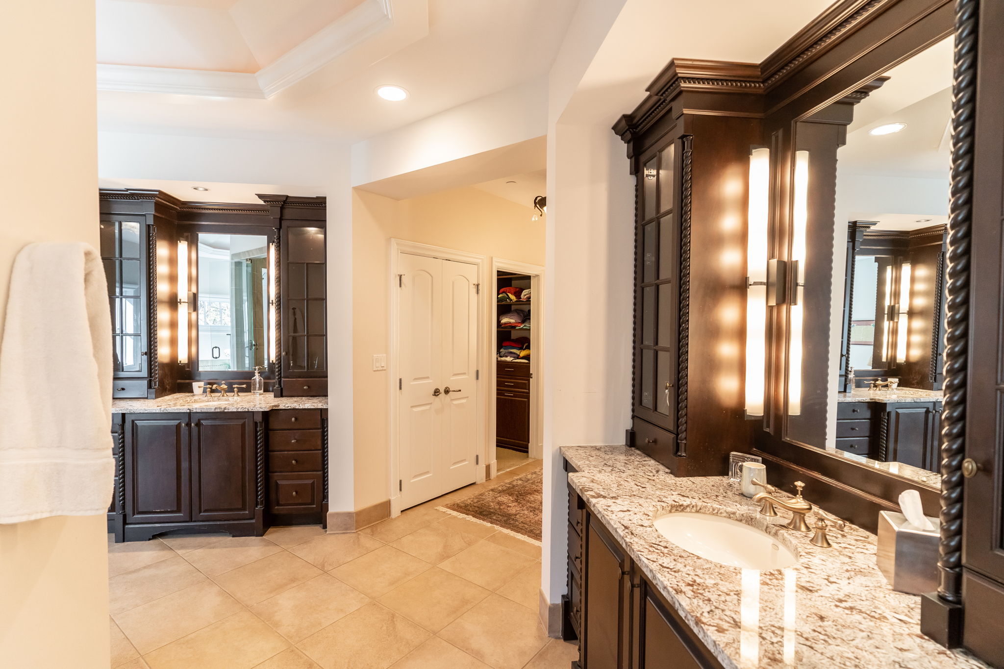 Primary Suite Dual Vanities, Makeup Vanity and Two Expansive Custom Closets