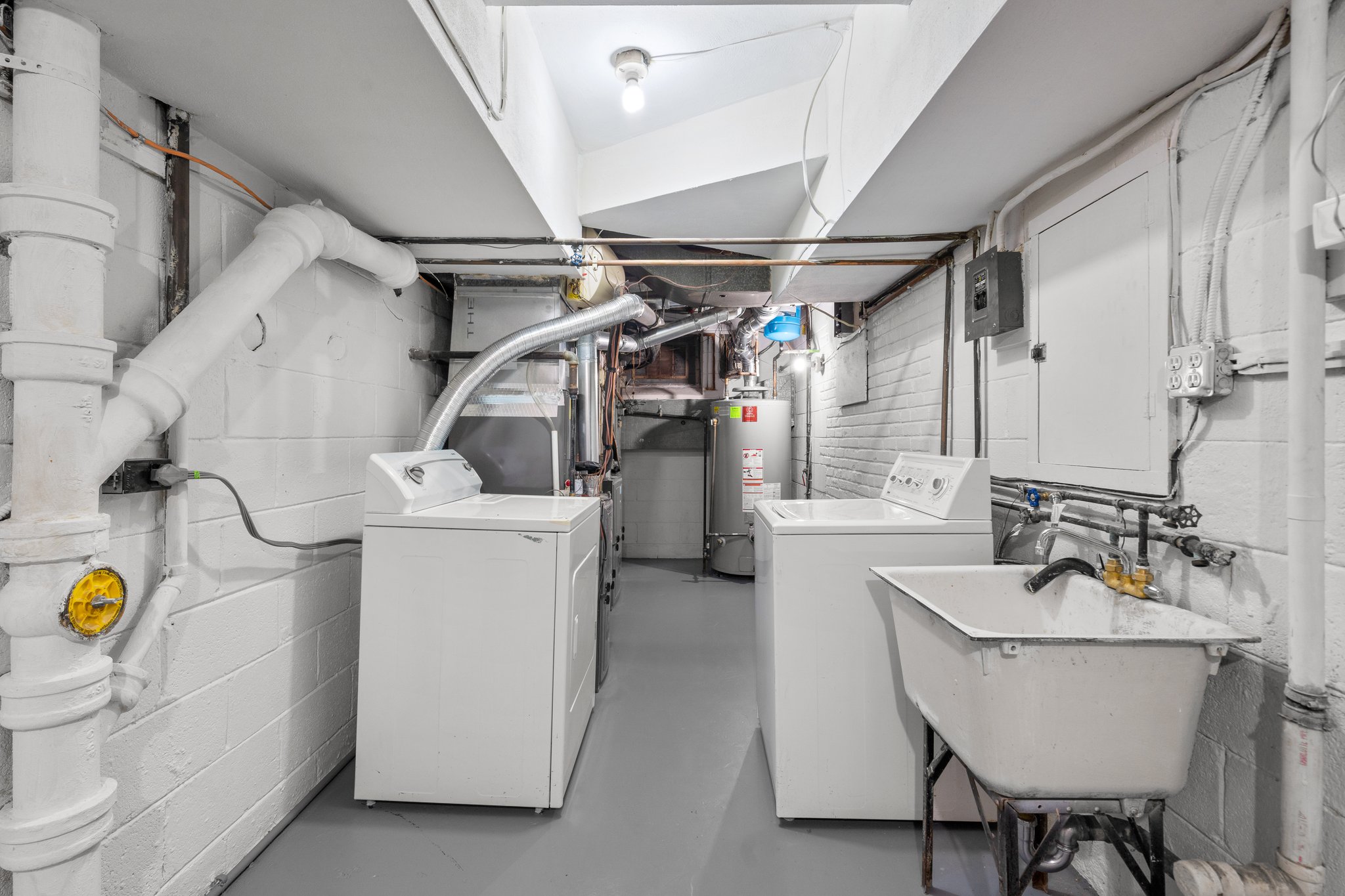 Laundry/Utility Room with Washer, Dryer, Utility Sink, Extra Fridge and Freezer