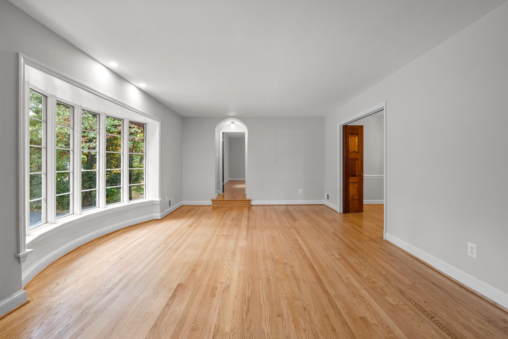 Large, Light-Filled Living Room with Bow WIndow