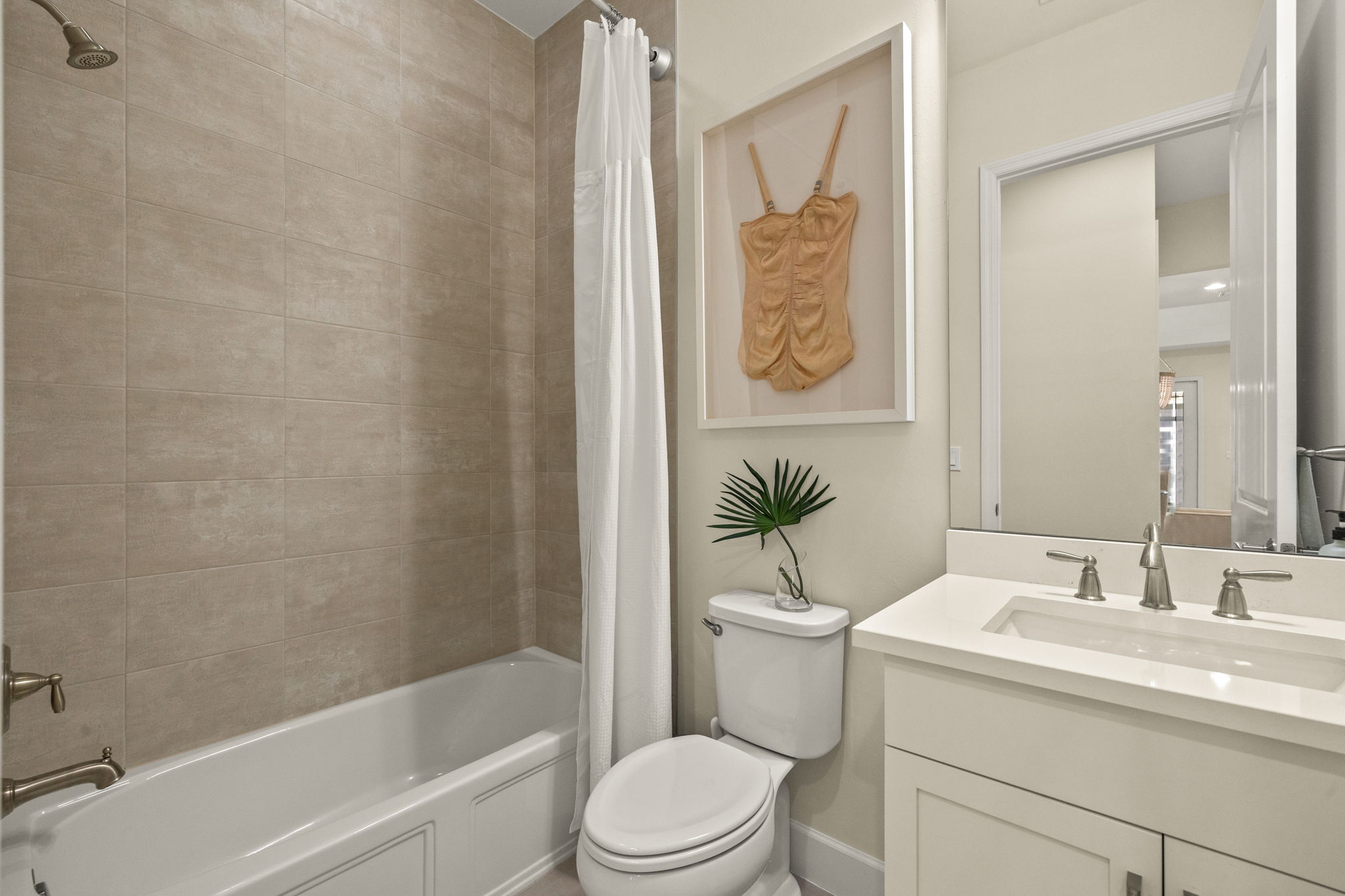 2nd 2nd Bathroom featuring a bathtub