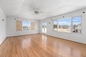 Bedroom 3 with exterior staircase to yard
