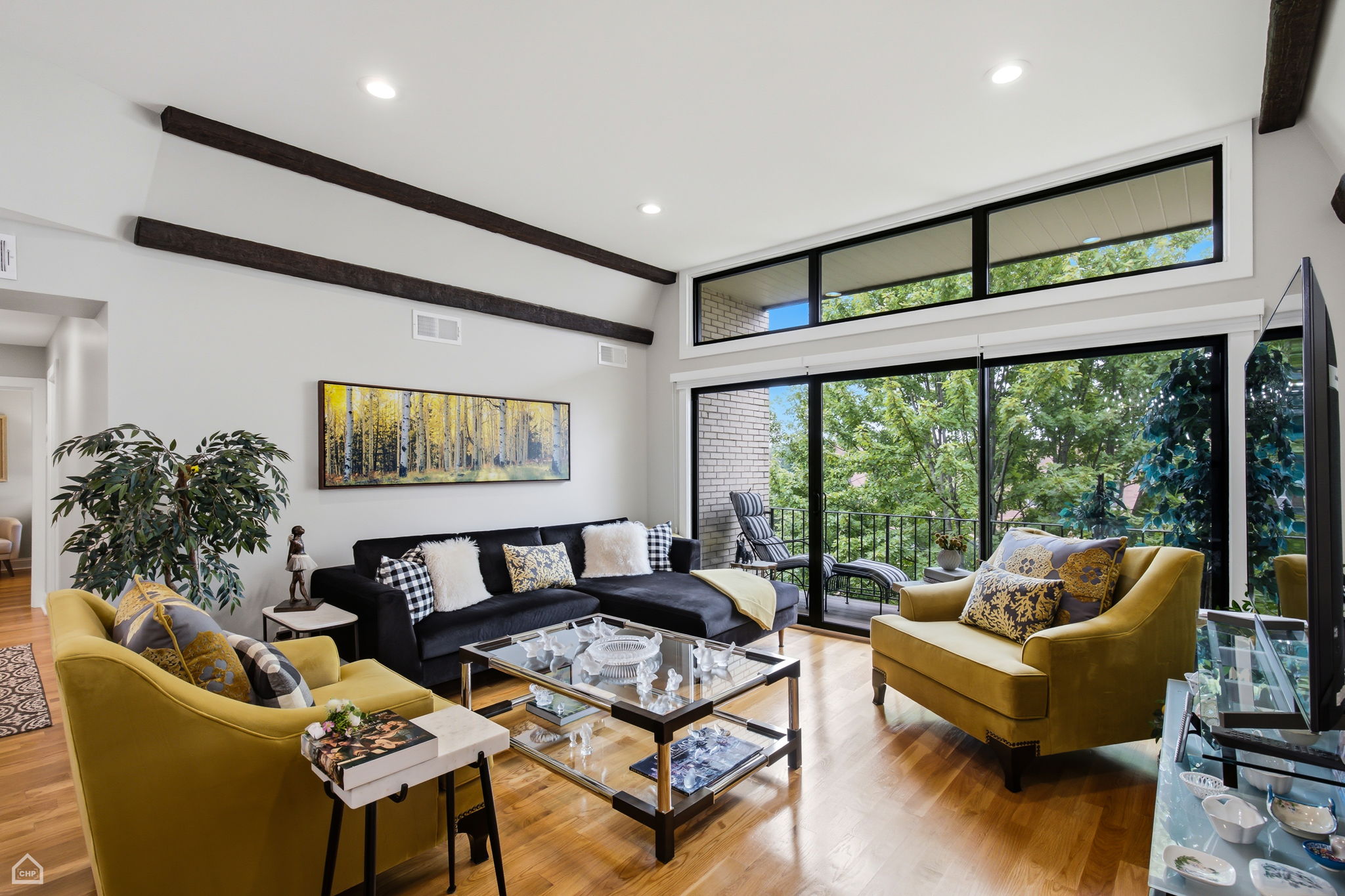 Spacious living room opens directly to the private balcony
