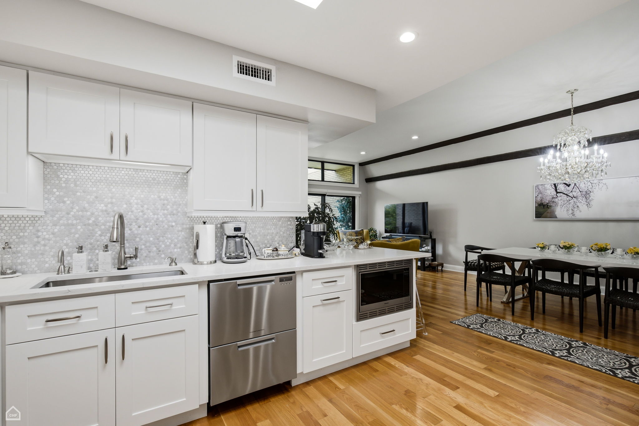 Pantry cabinet, stainless steel appliances. Excellent layout for entertaining and daily living