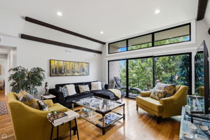 Spacious living room opens directly to the private balcony
