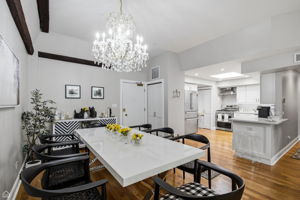 Adjacent dining area is generously proportioned and easily accommodates a large dining table