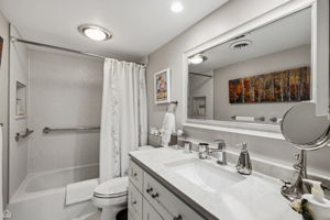 Immaculate second full bath is conveniently located across the hall from second bedroom