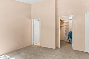 Main bedroom en suite to left/walk-in closet on right,