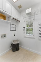 Laundry Room with Upgraded Tile Floors